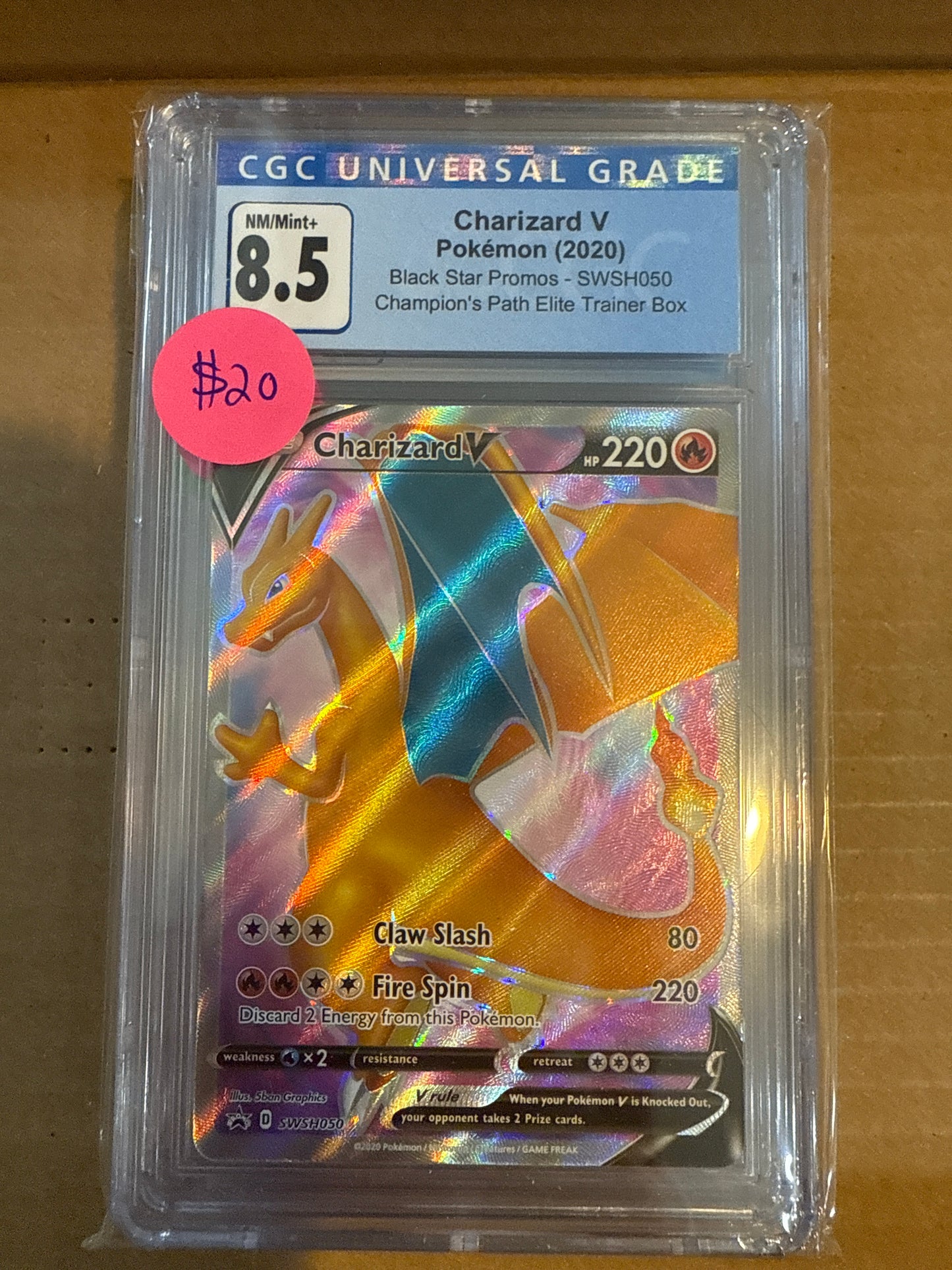 Charizard V 2020 SWSH050 CGC 8.5